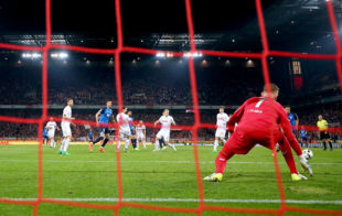 COLOGNE, GERMANY - APRIL 21: Kerem Demirbay (obscure) of Hoffenheim scores the equalizing goal during the Bundesliga match between 1. FC Koeln and TSG 1899 Hoffenheim at RheinEnergieStadion on April 21, 2017 in Cologne, Germany. 