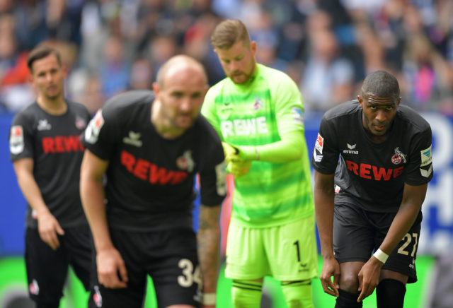 HAMBURG, GERMANY - APRIL 01: Konstantin Rausch and Anthony Modeste of Cologne look dejected during the Bundesliga match between Hamburger SV and 1. FC Koeln at Volksparkstadion on April 1, 2017 in Hamburg, Germany.