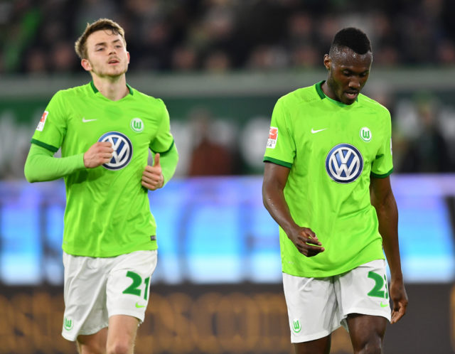 WOLFSBURG, GERMANY - APRIL 05: Jannes Horn and Josuha Guilavogui of Wolfsburg look dejected during the Bundesliga match between VfL Wolfsburg and SC Freiburg at Volkswagen Arena on April 5, 2017 in Wolfsburg, Germany. 