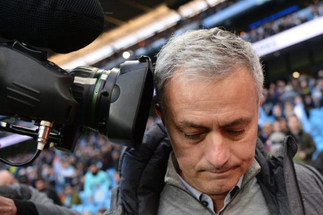 Manchester United's Portuguese manager Jose Mourinho gets close to a broadcast camera during the English Premier League football match between Manchester City and Manchester United at the Etihad Stadium in Manchester, north west England, on April 27, 2017. 