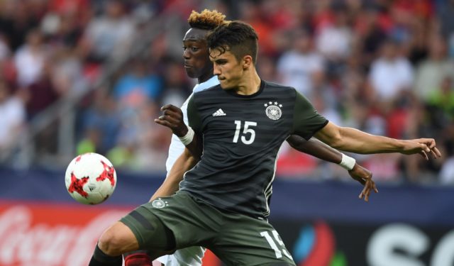 Germany's Marc-Oliver Kempf (R) and England's forward Tammy Abraham vie for the ball during the additional time during the UEFA U-21 European Championship football semi final match England v Germany in Tychy, Poland on June 27, 2017. / AFP PHOTO / PIOTR NOWAK