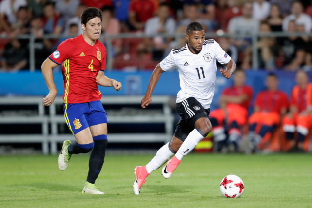 KRAKOW, POLAND - JUNE 30: Serge Gnabry of Germany gets away from Jorge Mere of Spain during the UEFA European Under-21 Championship Final between Germany and Spain at Krakow Stadium on June 30, 2017 in Krakow, Poland. 