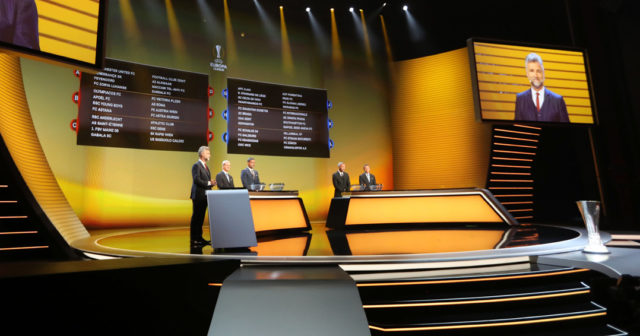 Boards displaying the groups of European football teams are pictured during the UEFA Europa League group stage draw ceremony, on August 26, 2016, in Monaco. / AFP / VALERY HACHE (Photo credit should read VALERY HACHE/AFP/Getty Images)