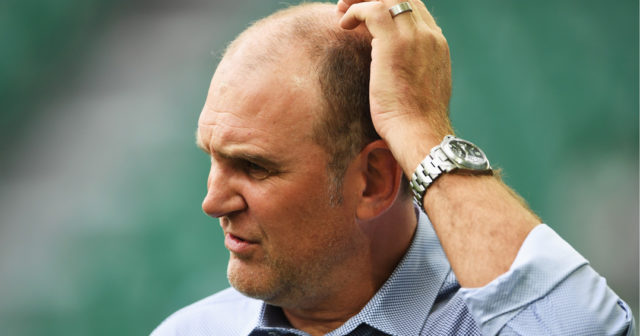 WOLFSBURG, GERMANY - SEPTEMBER 10: Joerg Schmadtke, sports director of Cologne ponders during the Bundesliga match between VfL Wolfsburg and 1. FC Koeln at Volkswagen Arena on September 10, 2016 in Wolfsburg, Germany. (Photo by Stuart Franklin/Bongarts/Getty Images)