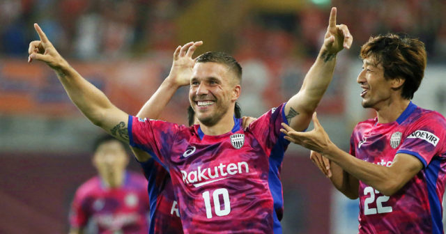 Vissel Kobe's Lukas Podolski of Germany (C) celebrates his first goal with his teammates during his J-League football match against Omiya Ardija in Kobe on July 29, 2017. / AFP PHOTO / JIJI PRESS / STR / Japan OUT (Photo credit should read STR/AFP/Getty Images)