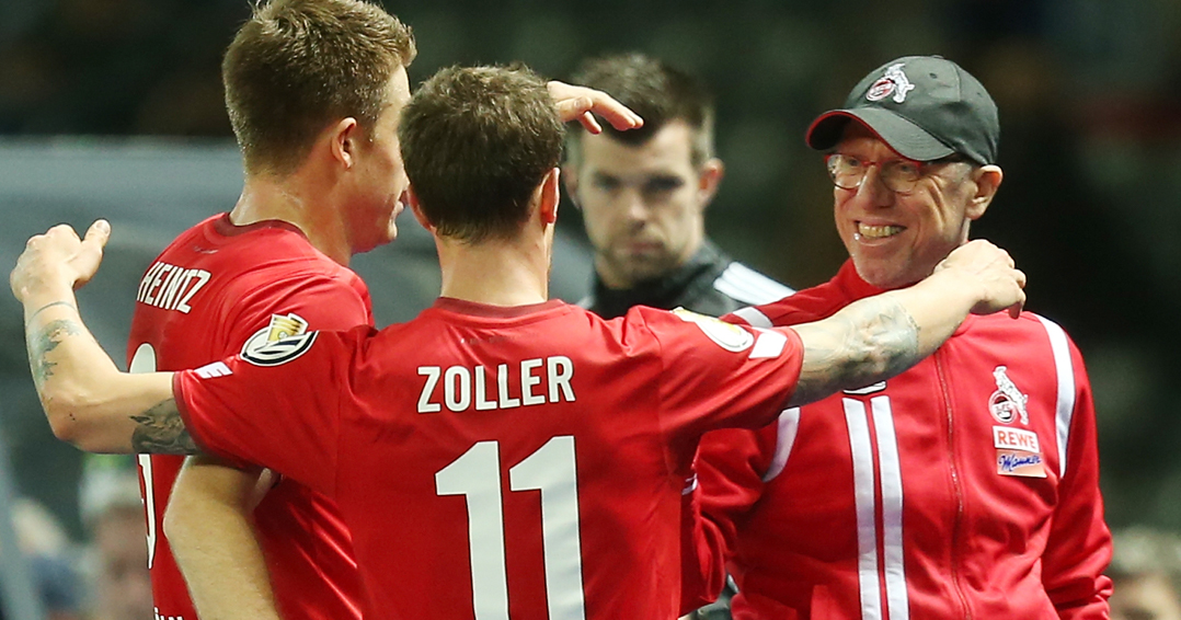 BERLIN, GERMANY - OCTOBER 25: Simon Zoller (C) of Koeln jubilates with team mates and head coach Peter Stoeger (R) after scoring the first goal during the DFB Cup match between Hertha BSC and 1. FC Koeln at Olympiastadion on October 25, 2017 in Berlin, Germany. (Photo by Matthias Kern/Bongarts/Getty Images)