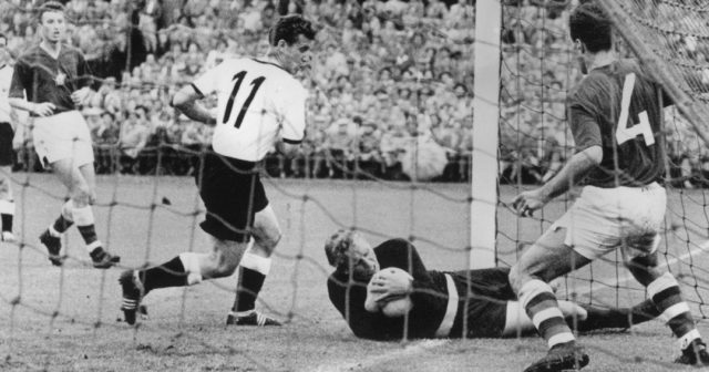 German forward Hans Schaefer shoves the Czech goalkeeper into goal, still holding the ball, during a World Cup match, 13th June 1958. Referee Arthur Ellis allowed the goal, which was hotly disputed by the Czech team. (Photo by Keystone/Hulton Archive/Getty Images)